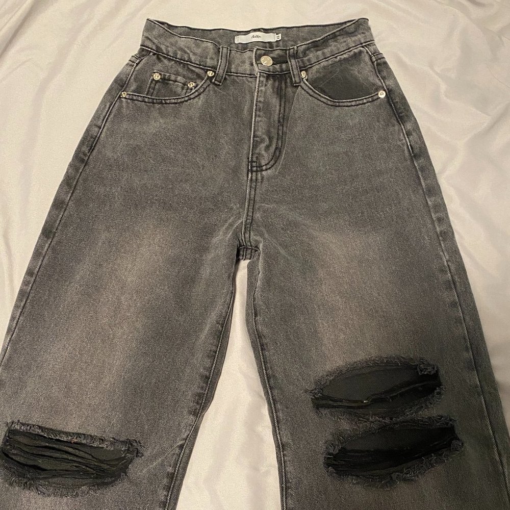 adika wide leg, high waisted, faded grey wash jeans with knee rips